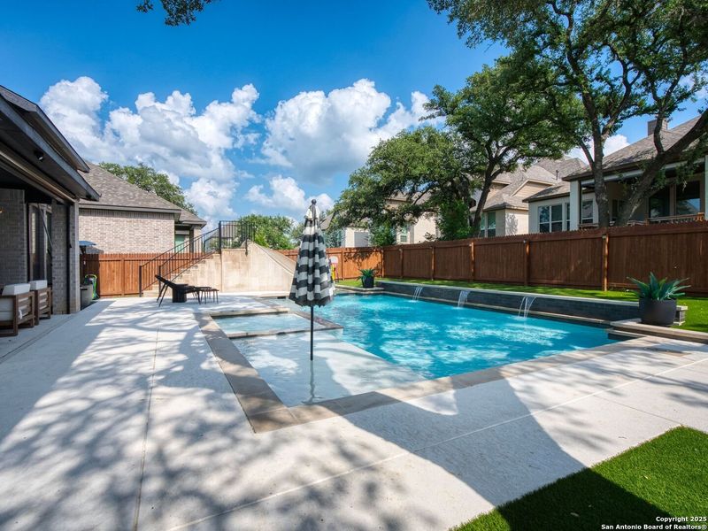 Front exterior of a new home in Balcones Creek 70', Boerne, TX, highlighting curb appeal (Image 2). Front exterior of a new home in Balcones Creek 70', Boerne, TX, highlighting curb appeal (Image 2).