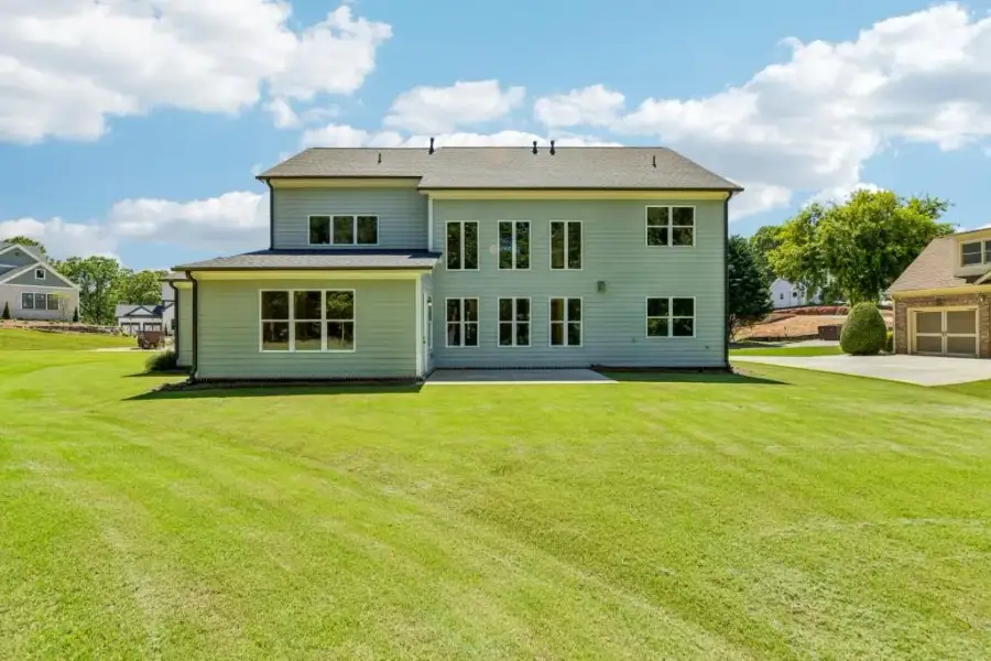 Exterior details and patio area of a home in White Post on Lake Lanier, Gainesville (Image 26).