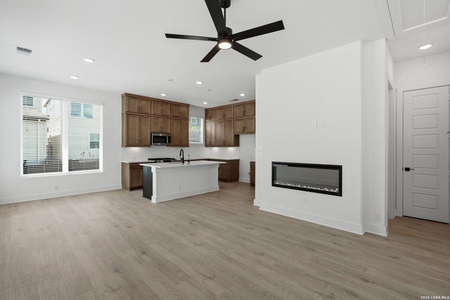 Furnished interior view inside a new home in Centero at Stone Oak, San Antonio (Image 6).