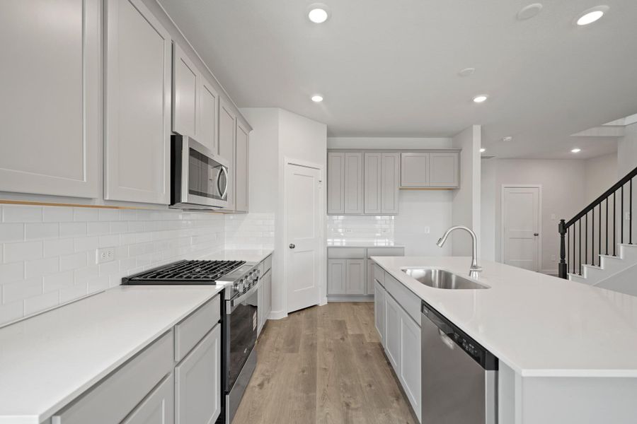 Furnished interior view inside a new home in Sunterra, Katy (Image 5).