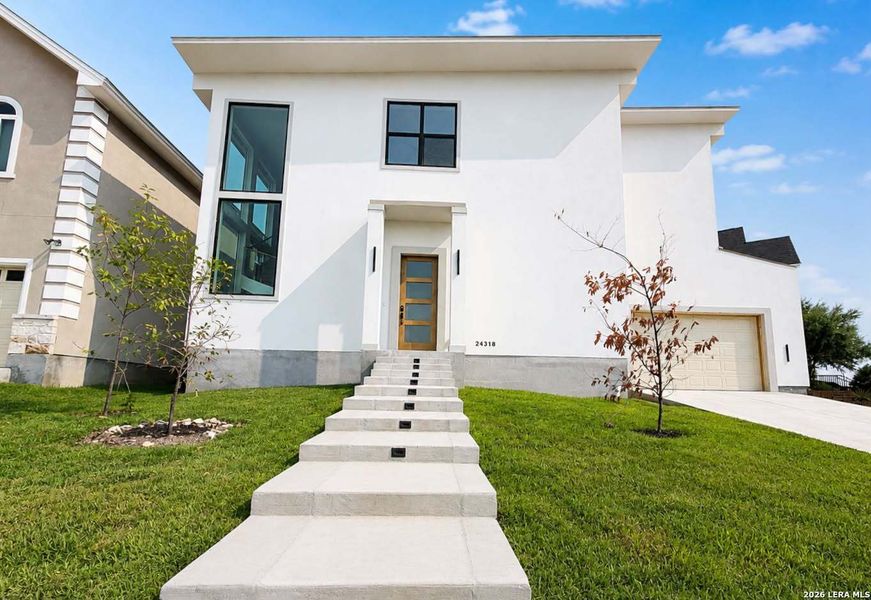 Exterior details and patio area of a home in , San Antonio (Image 26).