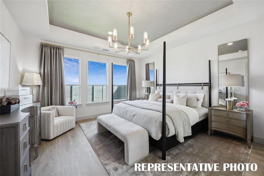 Dreamy owner's suites are plentiful in our homes in Painted Tree Woodlands West!  REPRESENTATIVE PHOTO OF MODEL HOME