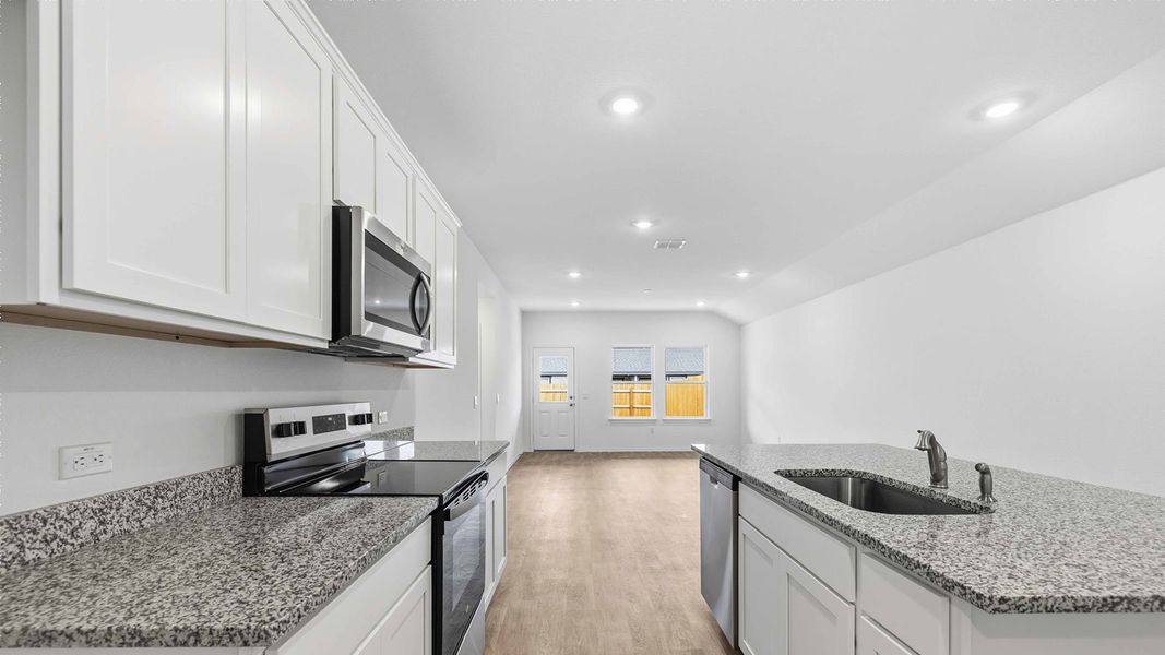 Furnished interior view inside a new home in Palomino, Manor (Image 7).