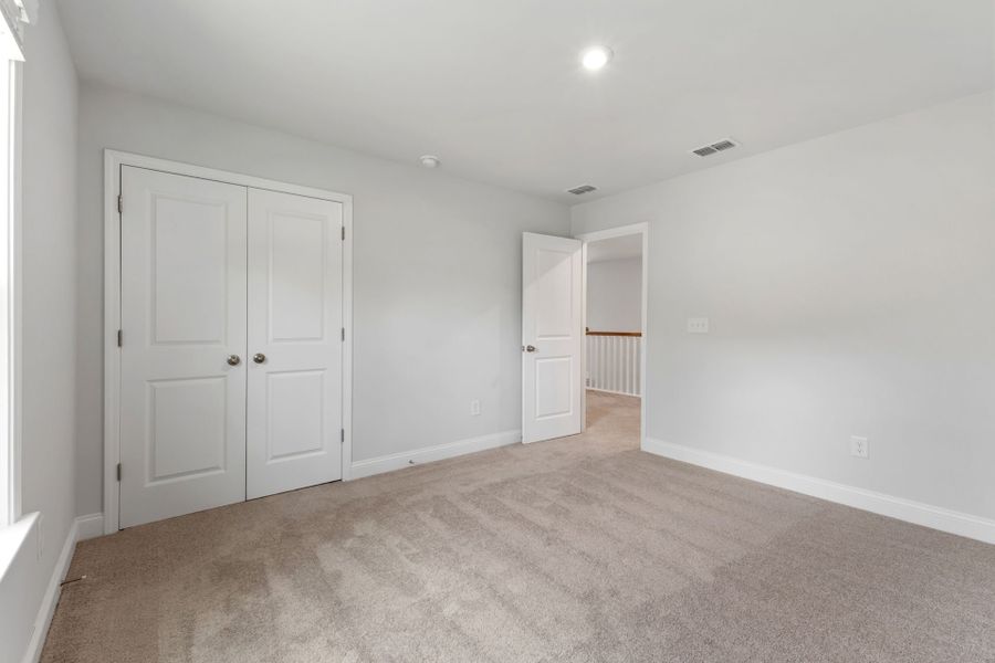 Spacious, unfurnished interior of a new home in Solserra, Shallotte (Image 18). Spacious, unfurnished interior of a new home in Solserra, Shallotte (Image 18).
