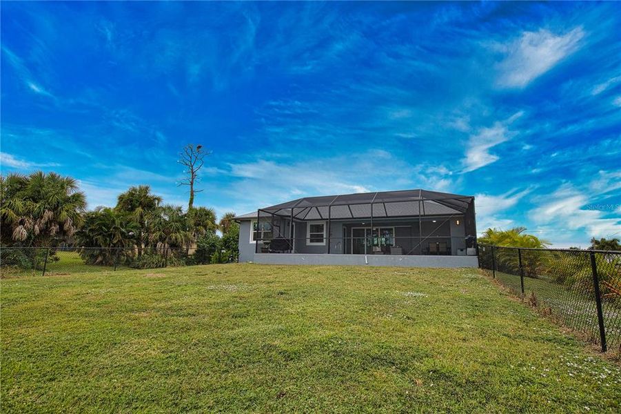 Exterior details and patio area of a home in , Rotonda West (Image 26).