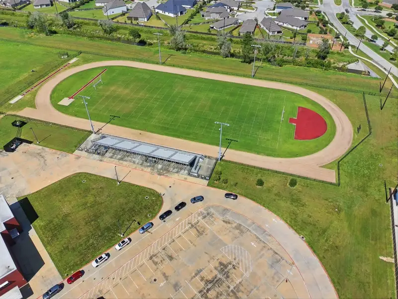 Community sports complex includes track andexpansive recreational fields. Community sports complex includes track andexpansive recreational fields.