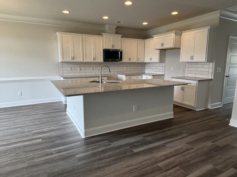 Furnished interior view inside a new home in Mebane Towne Center, Mebane (Image 3).