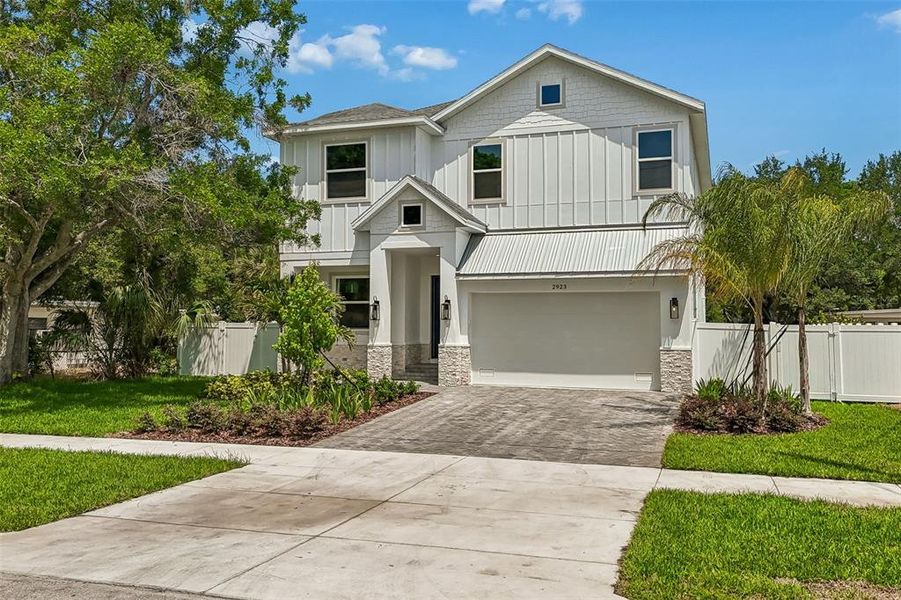 Front exterior of a new home in , Tampa, FL, highlighting curb appeal (Image 33).