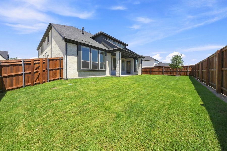 Exterior details and patio area of a home in Hillside Village, Celina (Image 4).