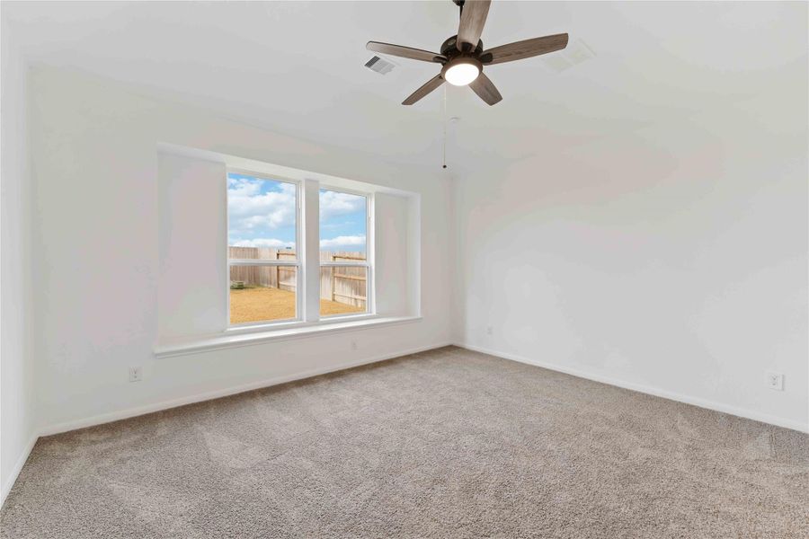 Spacious, unfurnished interior of a new home in Sunterra, Katy (Image 23).