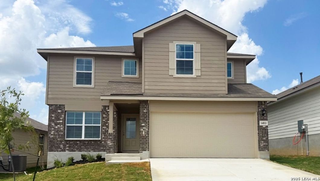 Front exterior of a new home in Stonehill, San Antonio, TX, highlighting curb appeal (Image 1). Front exterior of a new home in Stonehill, San Antonio, TX, highlighting curb appeal (Image 1).