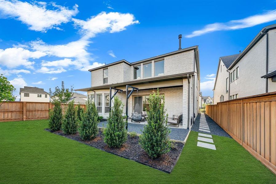 Exterior details and patio area of a home in Fields 50', Frisco (Image 22).