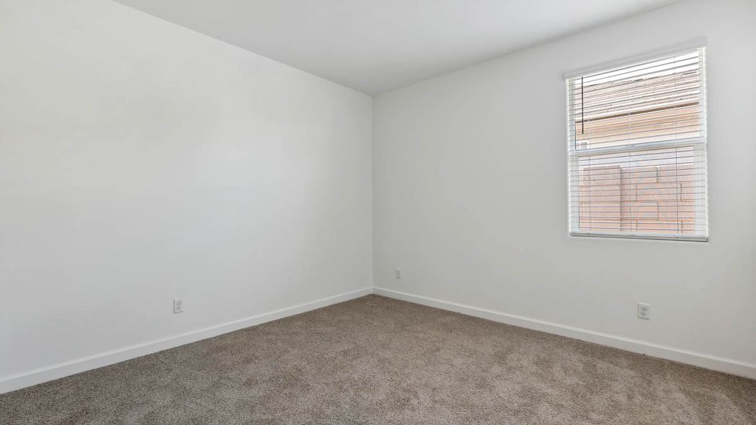 Spacious, unfurnished interior of a new home in Quail Ranch, San Tan Valley (Image 23).