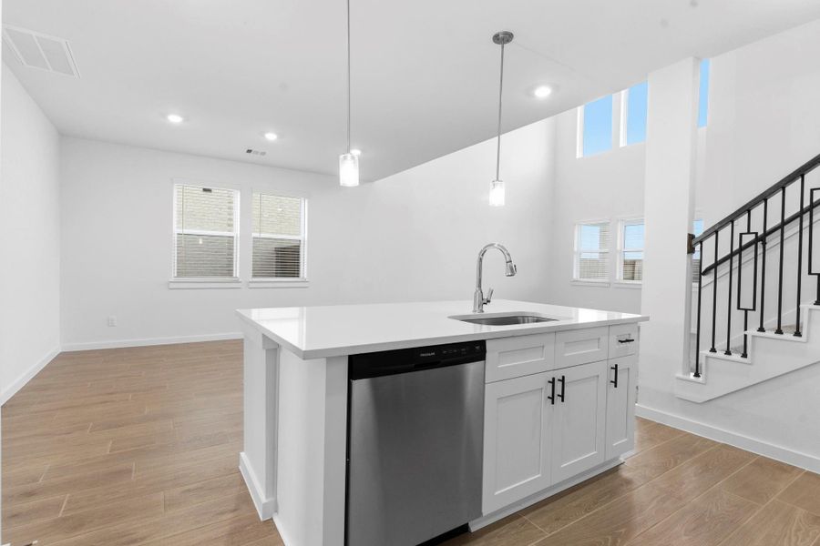 Furnished interior view inside a new home in , Iowa Colony (Image 6).