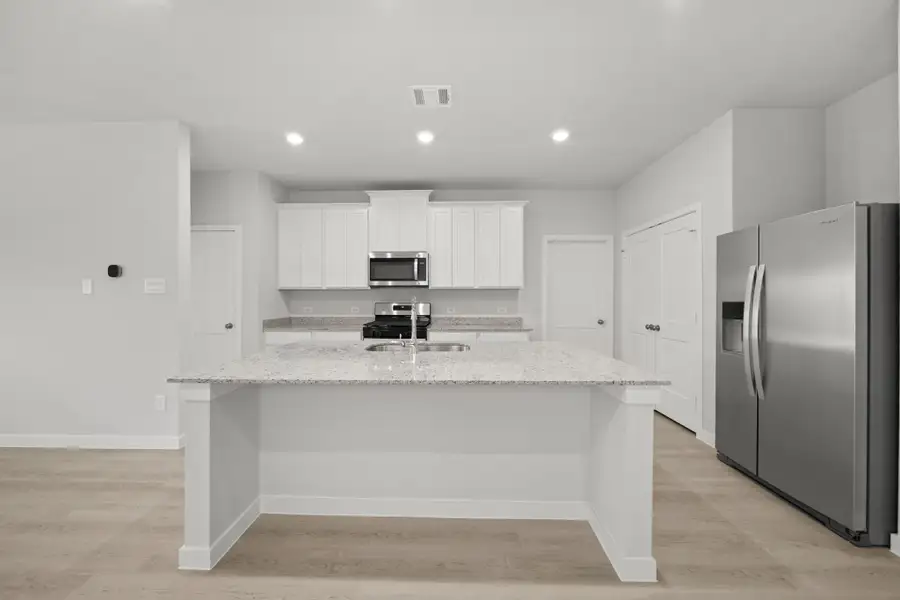 Furnished interior view inside a new home in Lexington Heights, Willis (Image 7). Furnished interior view inside a new home in Lexington Heights, Willis (Image 7).