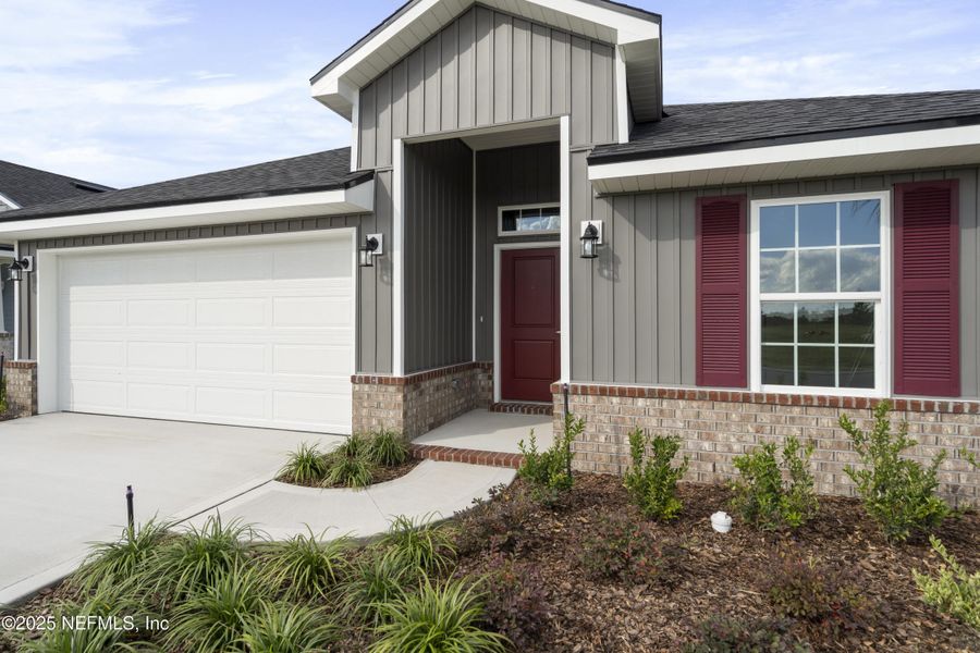 Exterior details and patio area of a home in Shadow Crest at Rolling Hills, Green Cove Springs (Image 2).