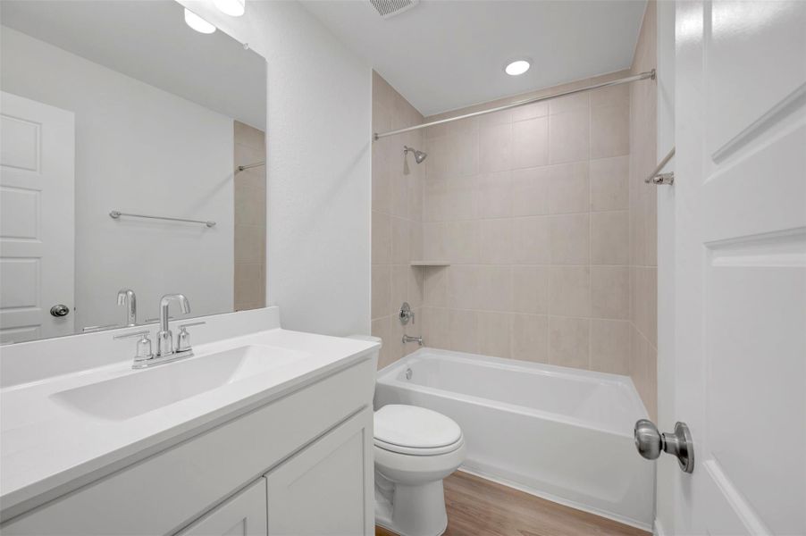 Furnished interior view inside a new home in Pinewood at Grand Texas, New Caney (Image 8).