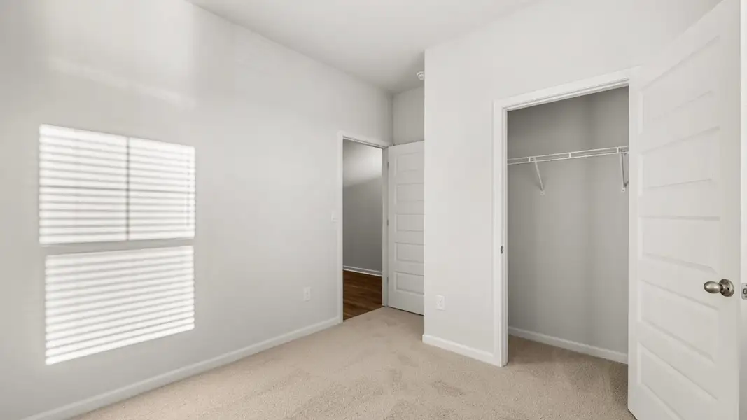 Representative unfurnished interior of a home built from the Sullivan by D.R. Horton in Highland Hills, Graniteville (Image 20). Representative unfurnished interior of a home built from the Sullivan by D.R. Horton in Highland Hills, Graniteville (Image 20).