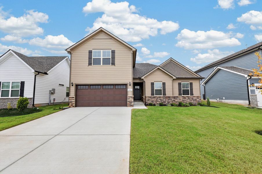 Front exterior of a new home in Salem Landing, Rockvale, TN, highlighting curb appeal (Image 2). Front exterior of a new home in Salem Landing, Rockvale, TN, highlighting curb appeal (Image 2).