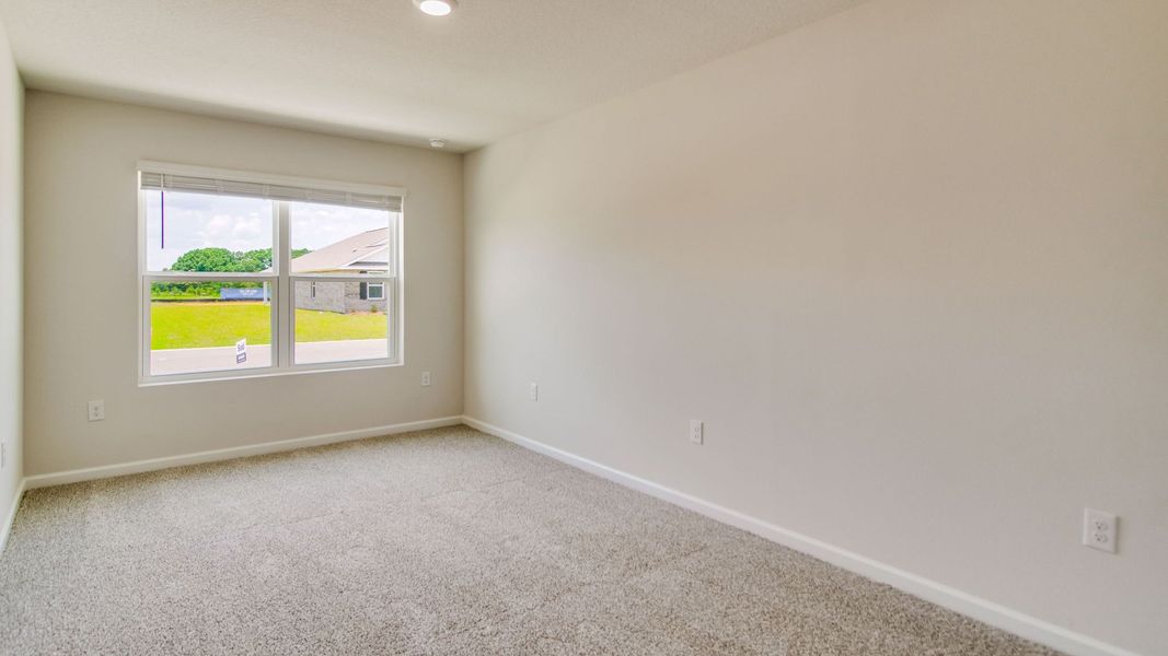 Spacious, unfurnished interior of a new home in The Enclave at Bar W Ranch, Baker (Image 29).