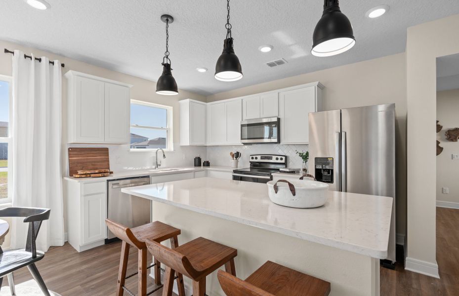 Furnished interior view inside a new home in Tohoqua, Kissimmee (Image 7).