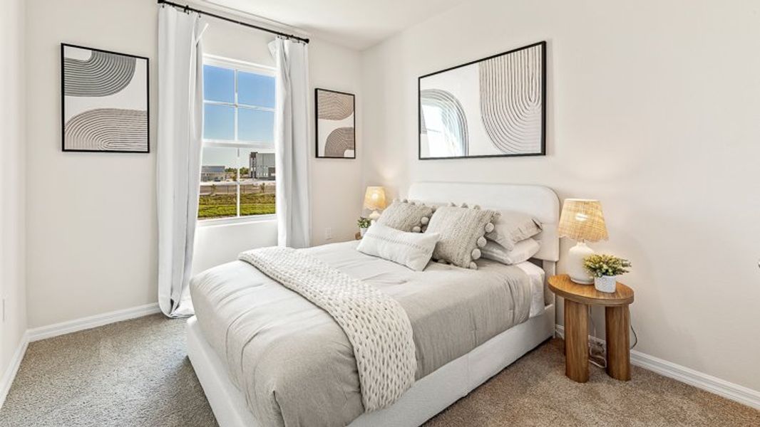 Representative furnished interior of a home built from the Pearson B by D.R. Horton in Townes at Island Lake, Pinellas Park (Image 12).