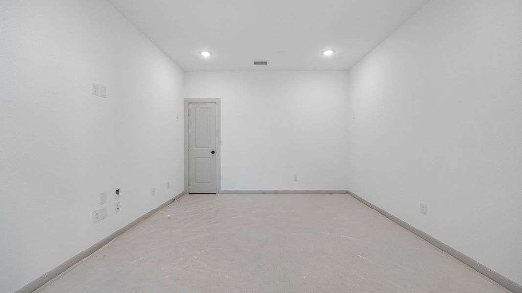 Representative unfurnished interior of a home built from the Orleans II by Normandy Homes in Rainwater Crossing, Celina (Image 14).
