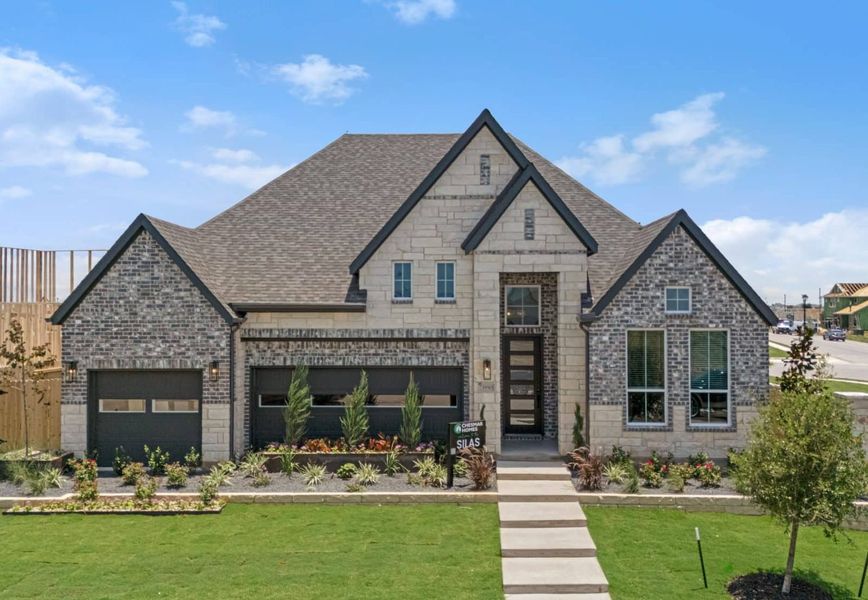 Representative exterior photo of a completed home built from the Silas by Chesmar Homes in Broken Oak, Georgetown, TX (Image 2). Representative exterior photo of a completed home built from the Silas by Chesmar Homes in Broken Oak, Georgetown, TX (Image 2).