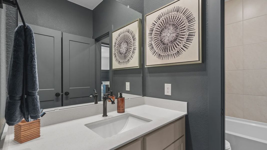 Representative furnished interior of a home built from the Acadia by Chesmar Homes in Elyson 50's, Katy (Image 32).