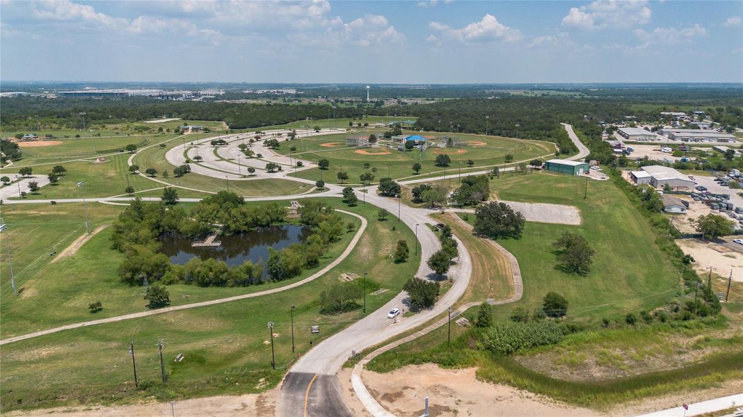 Aerial overview of property's location with a nearby body of water Aerial overview of property's location with a nearby body of water