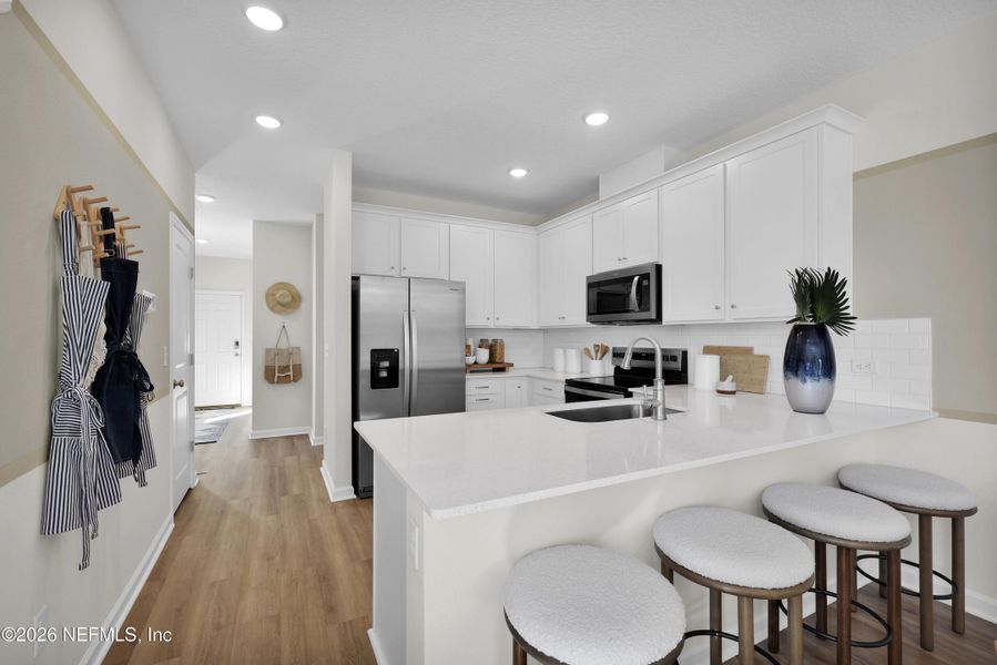 Furnished interior view inside a new home in Baxley Villas, Middleburg (Image 6).