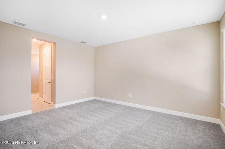 Spacious, unfurnished interior of a new home in Colbert Landings, Palm Coast (Image 12).