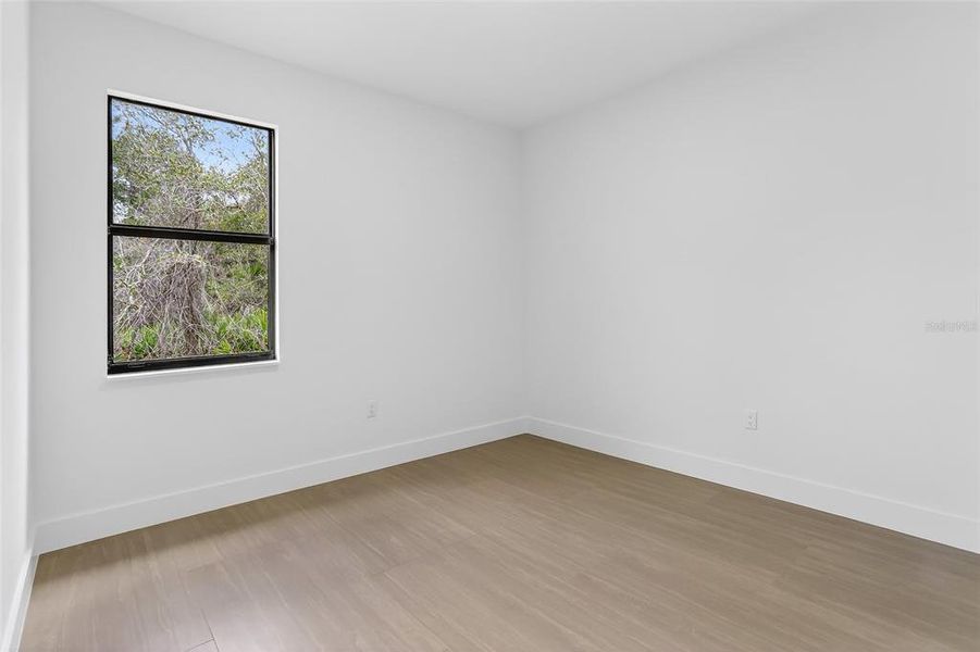 Spacious, unfurnished interior of a new home in , Port Charlotte (Image 38).