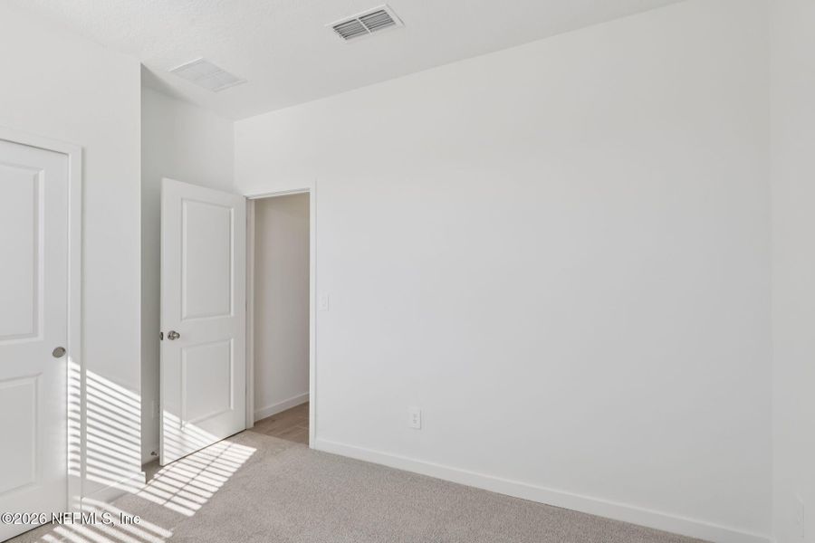 Spacious, unfurnished interior of a new home in Flagler Village - Signature Series, Palm Coast (Image 21).