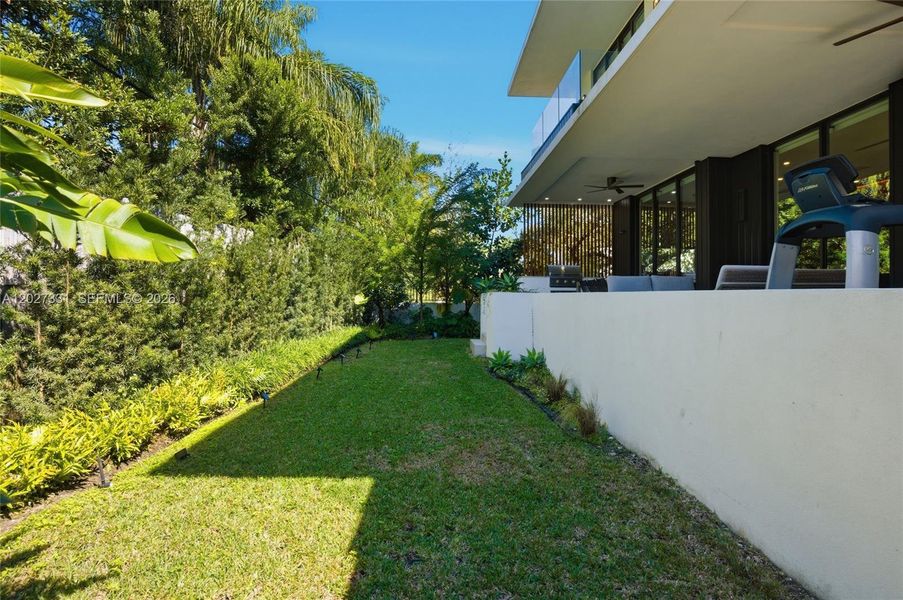 Exterior details and patio area of a home in , Miami Beach (Image 27). Exterior details and patio area of a home in , Miami Beach (Image 27).