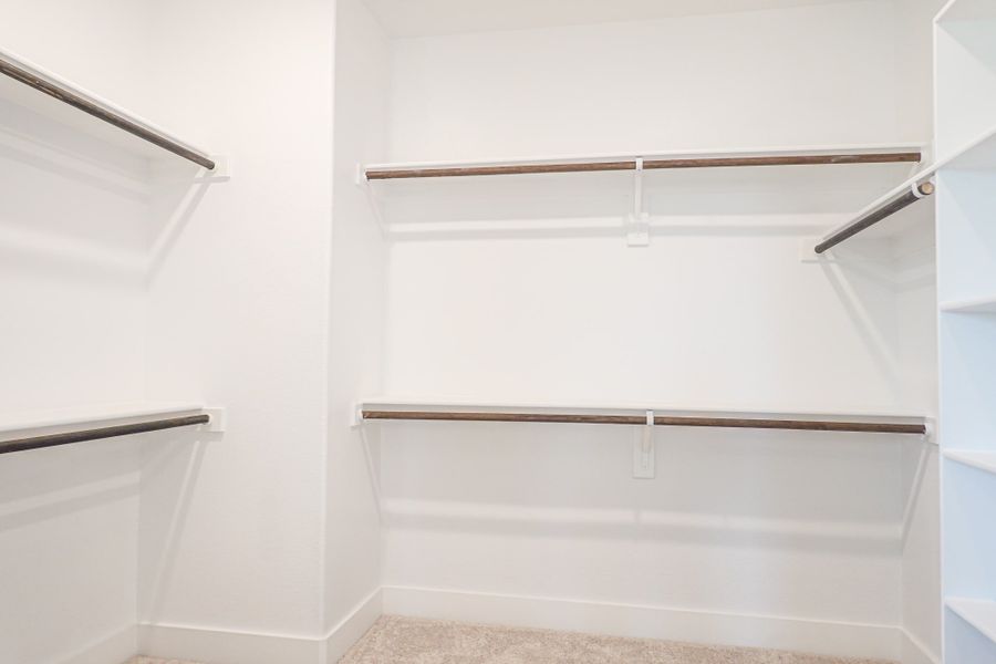 Representative furnished interior of a home built from the The Aleutian by Lillian Custom Homes in Polo Ridge, Heath (Image 15).