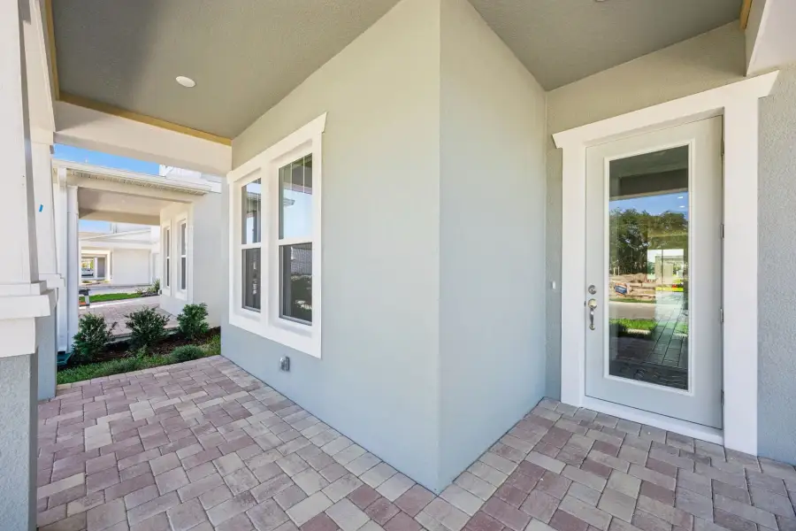 Exterior details and patio area of a home in Northlake at Ovation, Winter Garden (Image 2).