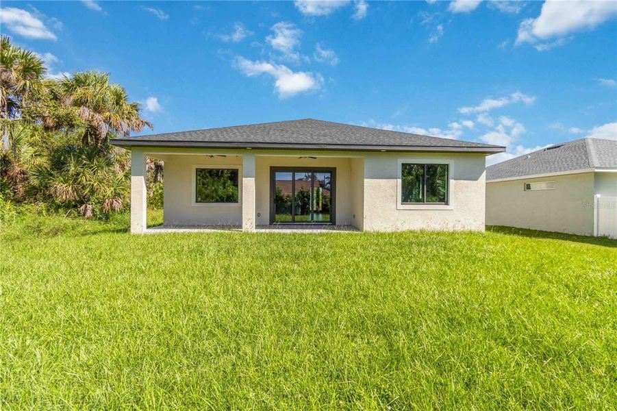 Front exterior of a new home in , Rotonda West, FL, highlighting curb appeal (Image 21).