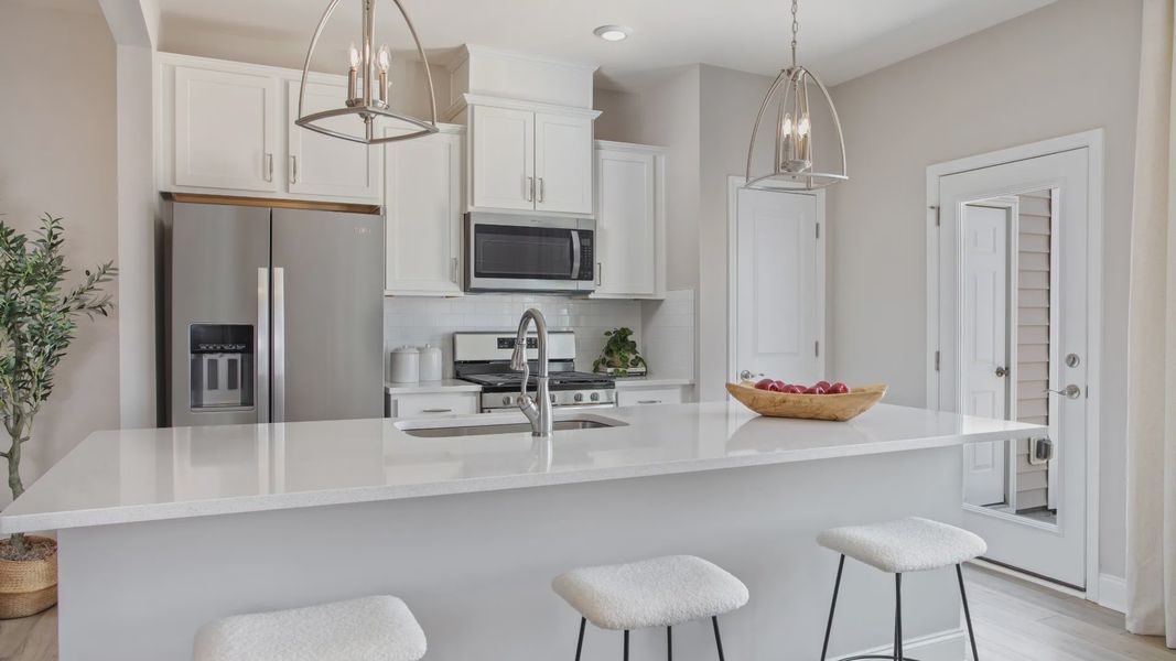 Furnished interior view inside a new home in Kensley Grove, Fuquay Varina (Image 4). Furnished interior view inside a new home in Kensley Grove, Fuquay Varina (Image 4).