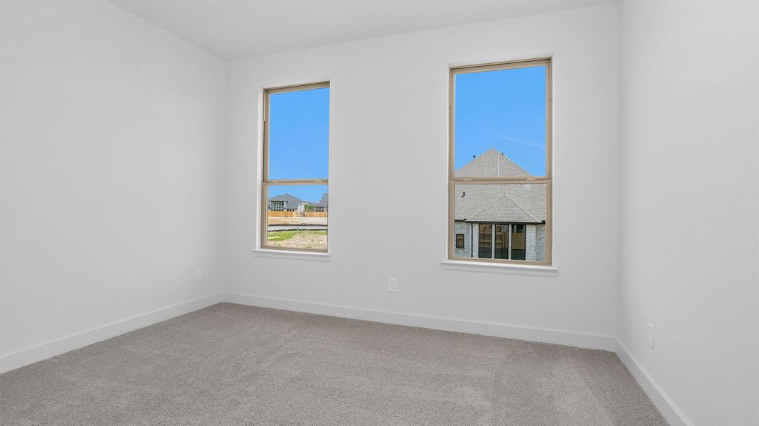 Spacious, unfurnished interior of a new home in Grange 60', Katy (Image 4).