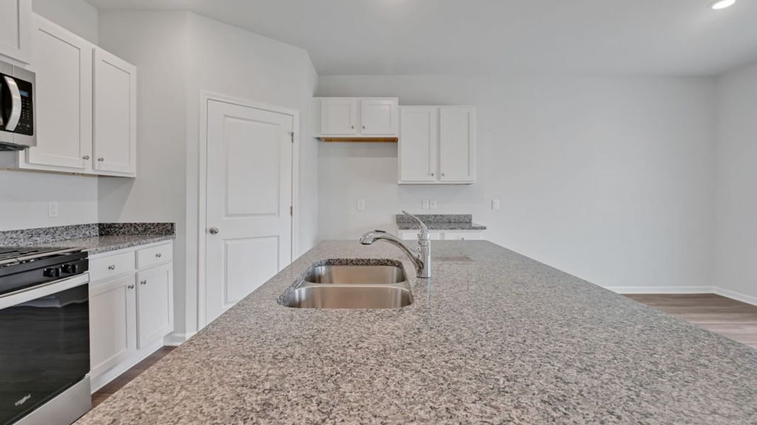 Representative furnished interior of a home built from the CALI by D.R. Horton in Vineyard Trail, Jacksonville (Image 11).