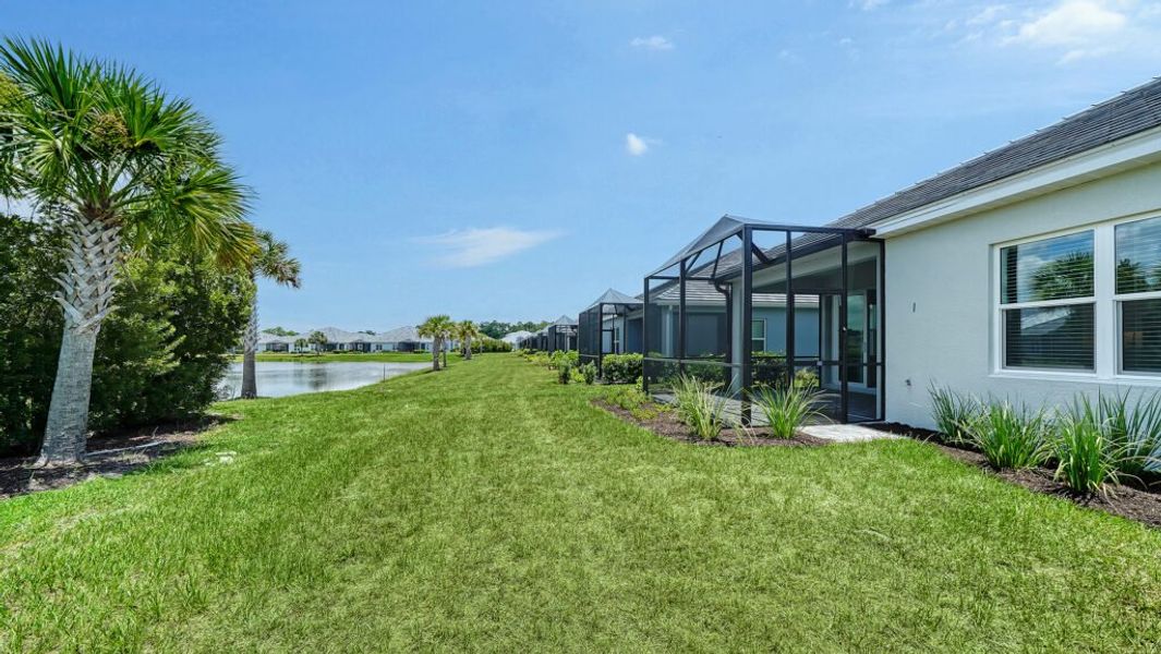 Exterior details and patio area of a home in Windward Real Estate and Homes for Sale in Sarasota, FL - Neal Communities, Lakewood Ranch (Image 19).