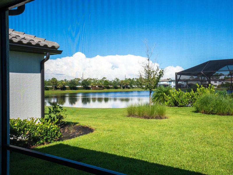 Front exterior of a new home in , Lakewood Ranch, FL, highlighting curb appeal (Image 20).