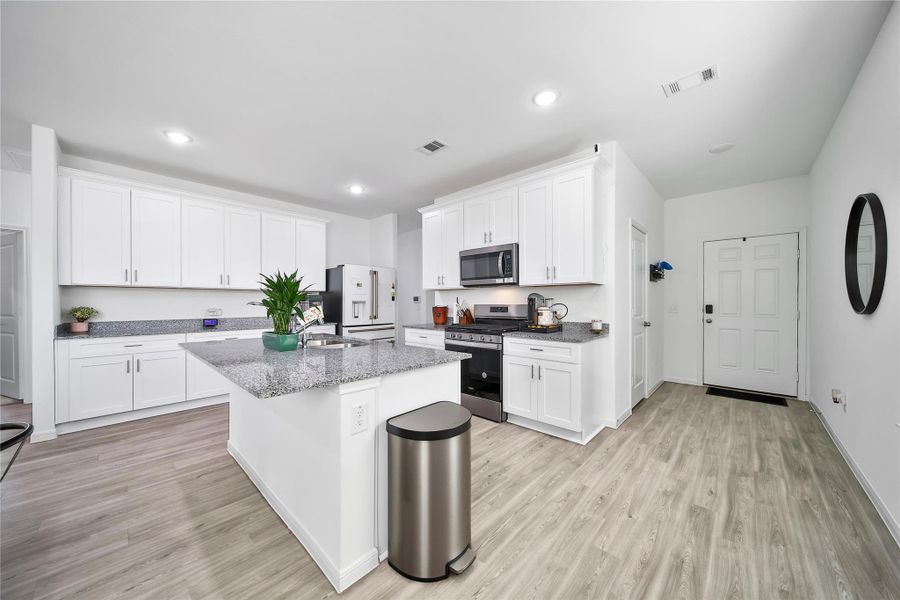 Furnished interior view inside a new home in , Cypress (Image 6).