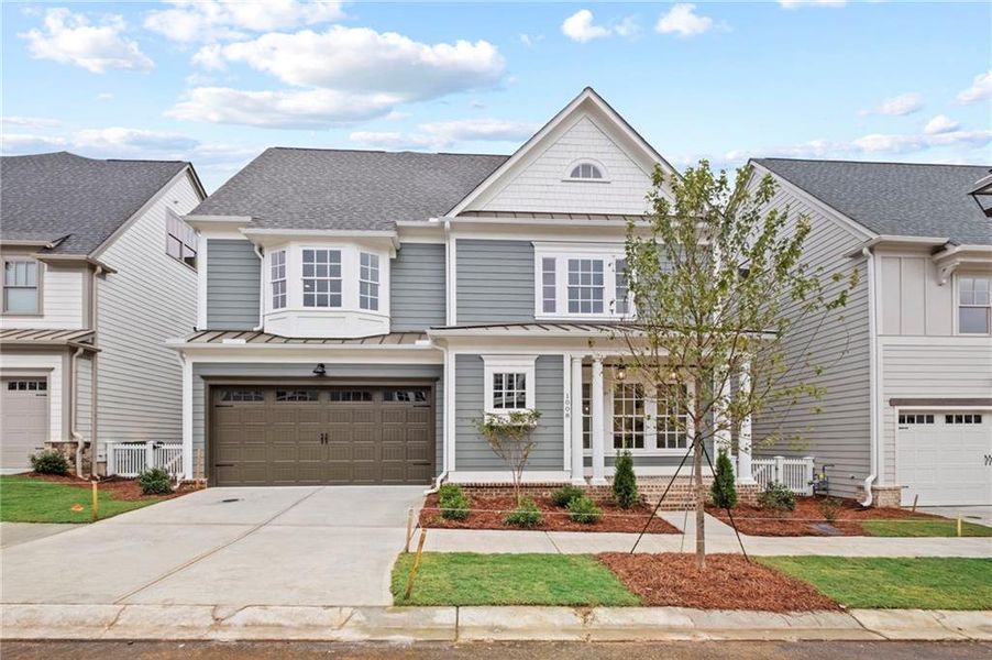 Front exterior of a new home in , Woodstock, GA, highlighting curb appeal (Image 20).