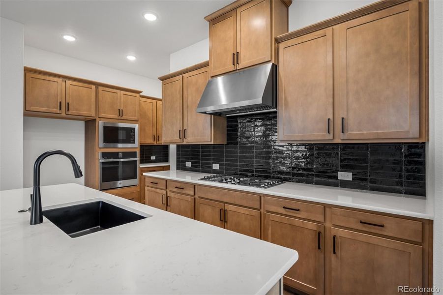 Furnished interior view inside a new home in Revel Crossing at Wolf Ranch – The Outlook Collection, Colorado Springs (Image 9).