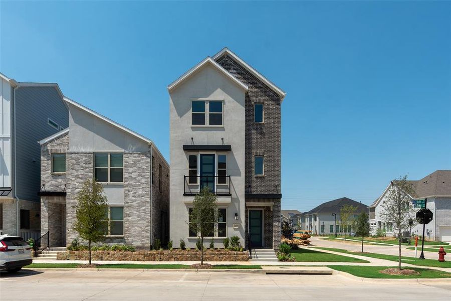 Front exterior of a new home in City Point, North Richland Hills, TX, highlighting curb appeal (Image 2).