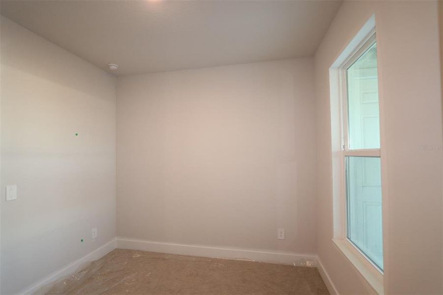 Spacious, unfurnished interior of a new home in Gracewater at Sarasota, Sarasota (Image 7).