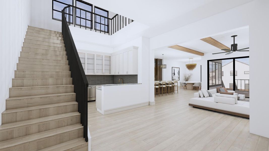 The first floor landing leads to the heart of the home where guests and family will gather between the family room, kitchen, dining room and wet bar. Each elegantly appointed with custom cabinets, beamed ceilings and finishes curated by Steve Clifton of Scene One Interiors.