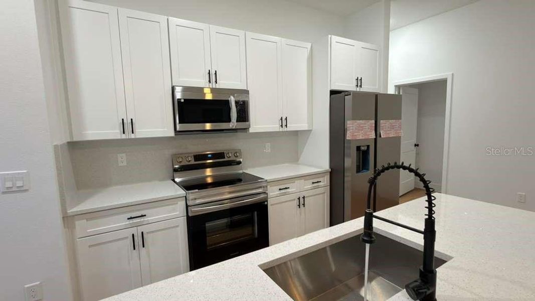 Furnished interior view inside a new home in , Citrus Springs (Image 31).